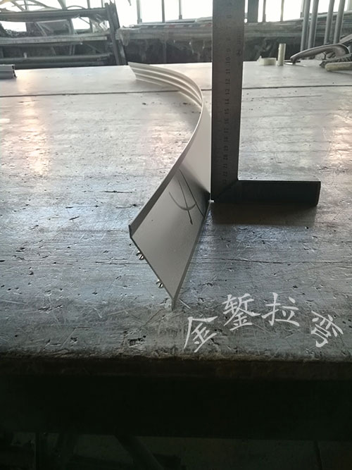 Louver blade stretch bending